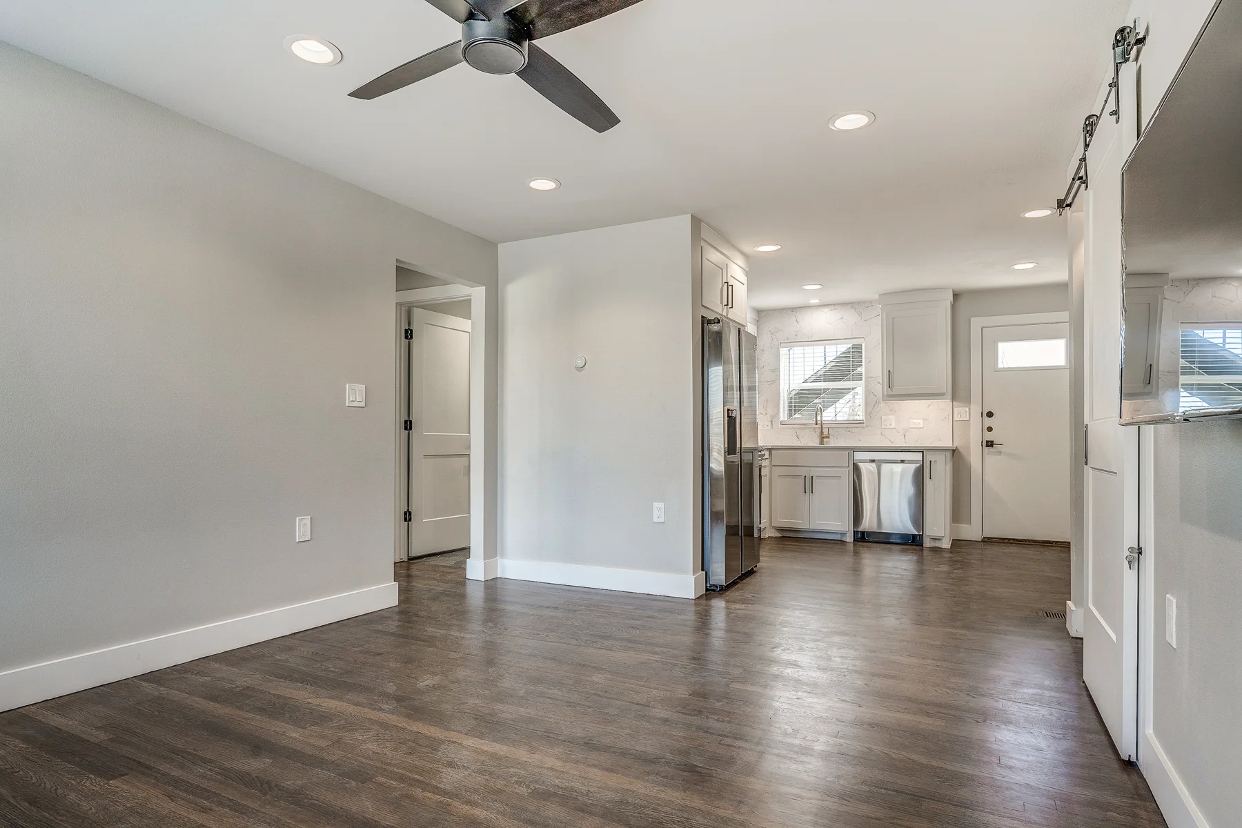 Representative WRV open-plan living and kitchen area; finishes vary by apartment