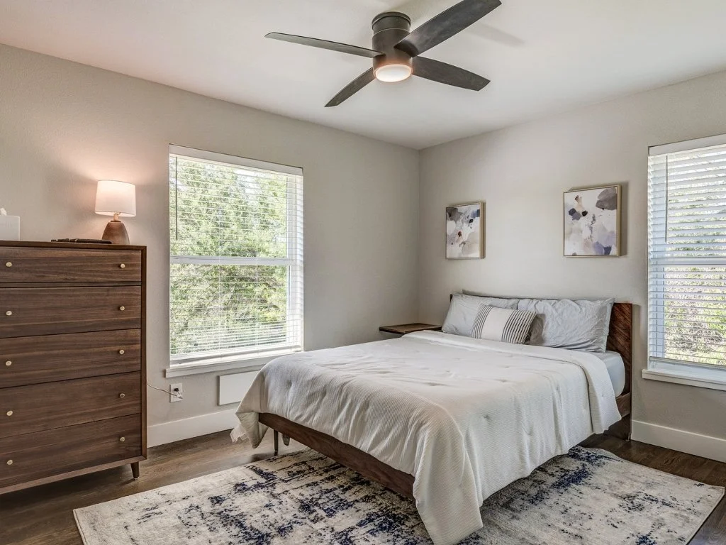Bright White Rock Views bedroom with original-style hardwood floors